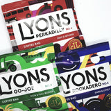 Three packets of Lyons coffees