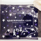 The front of a pack containing a jasmine Spacemask self-heating eye mask