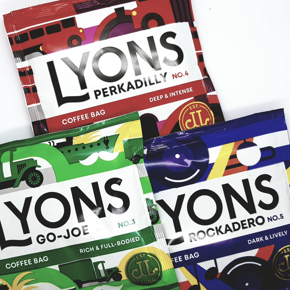 The front of three packs of coffee containing a Lyons Go-Joe, Perkadilly and Rockadero coffee bag