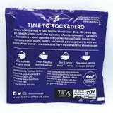 The back of a pack containing a Lyons Rockadero coffee bag