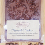 A close up of a slab of handmade moreish mocha Belgian dark chocolate showing the label
