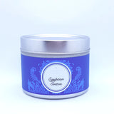 An egyptian cotton fragrant candle in a tin with the lid on